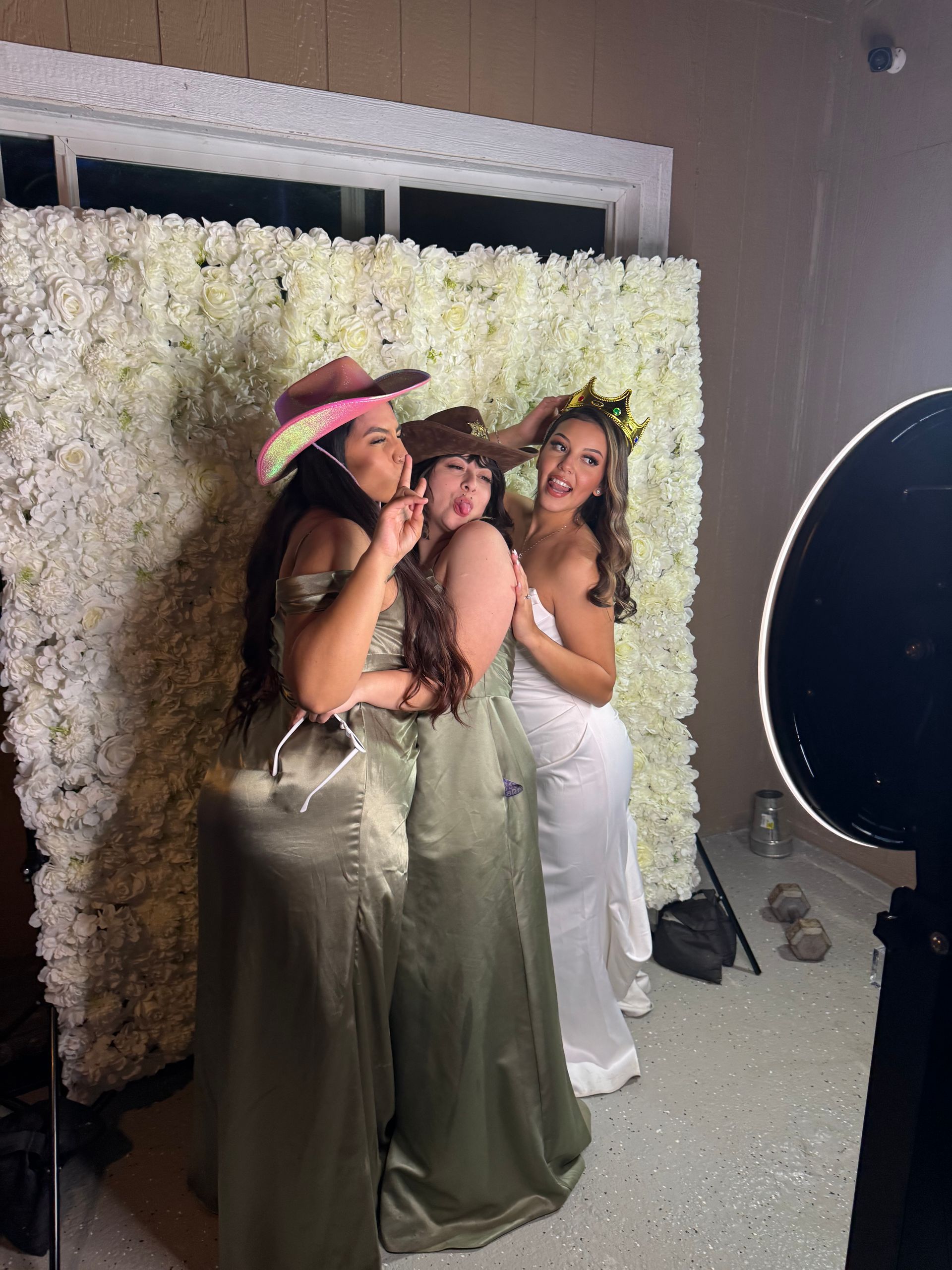 Bride and bridesmaids enjoying the Brightlight Photo Booth at Rancho Las Palmas in Perris, CA