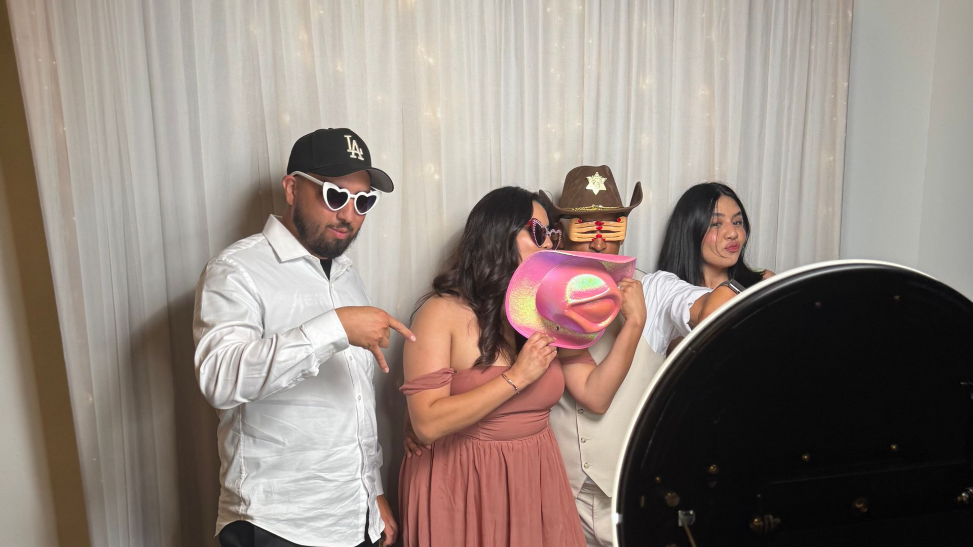 Wedding guests enjoying a luxury photo booth at Wedgewood Weddings Fallbrook Estate
