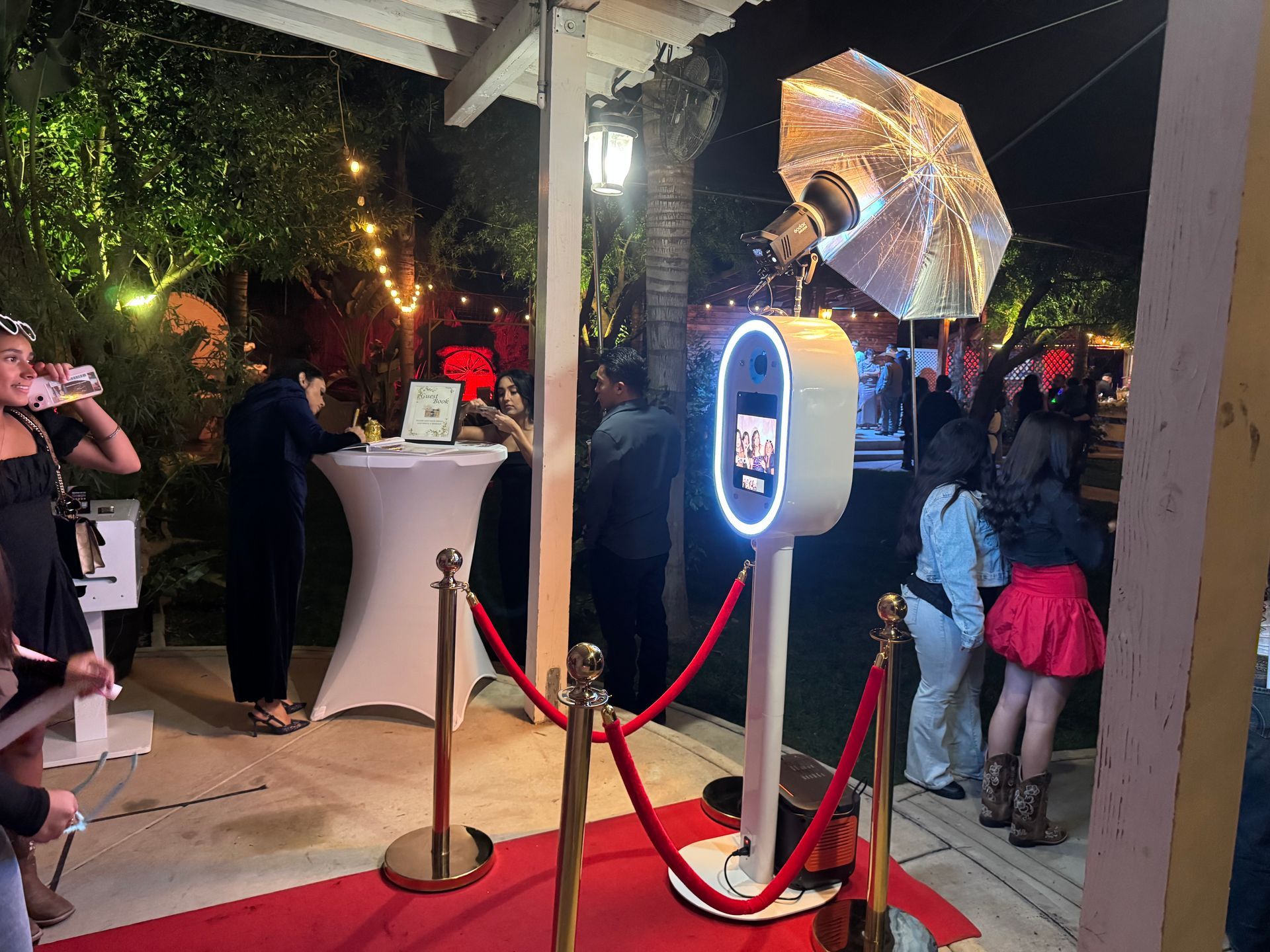 Prestige quinceañera photo booth setup with red carpet