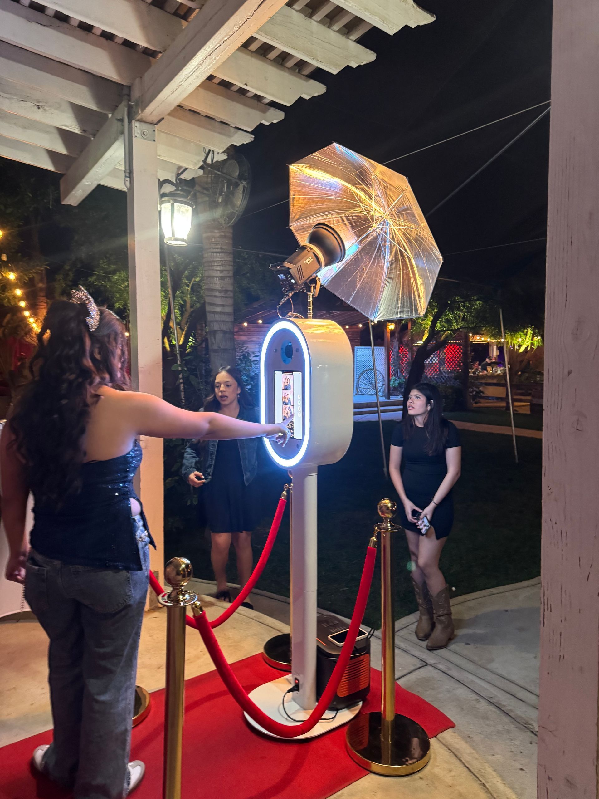 Hailey enjoying the photo booth at her quinceañera at Rancho Las Palmas in Perris, CA