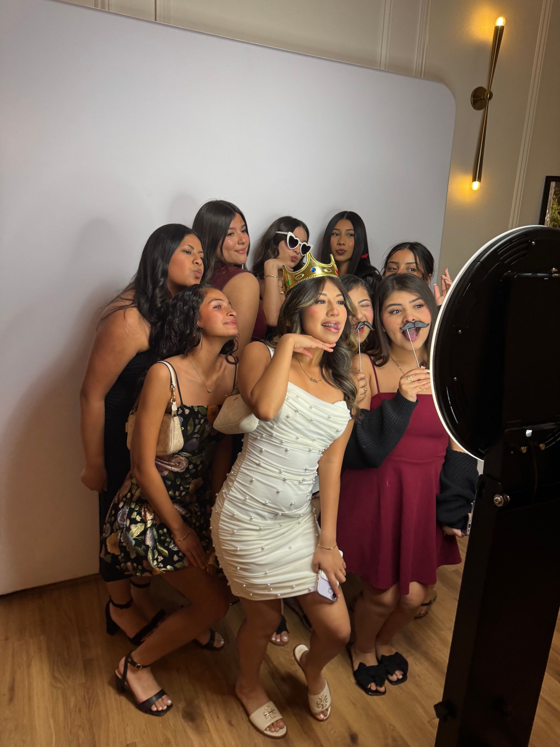 Friends capturing fun group photos with Brightlight's modern selfie photo booth