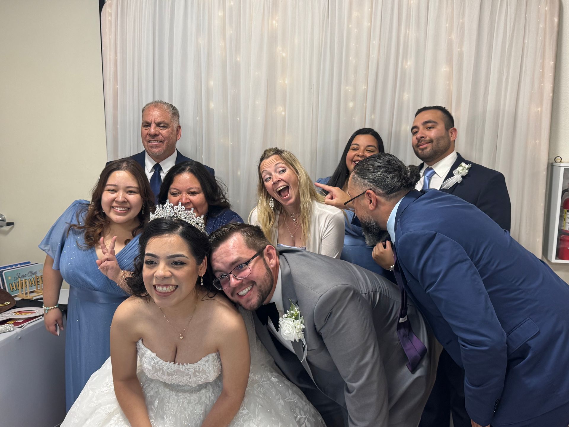 Guests enjoying the Brightlight Photo Booth at a wedding reception in Moreno Valley, California