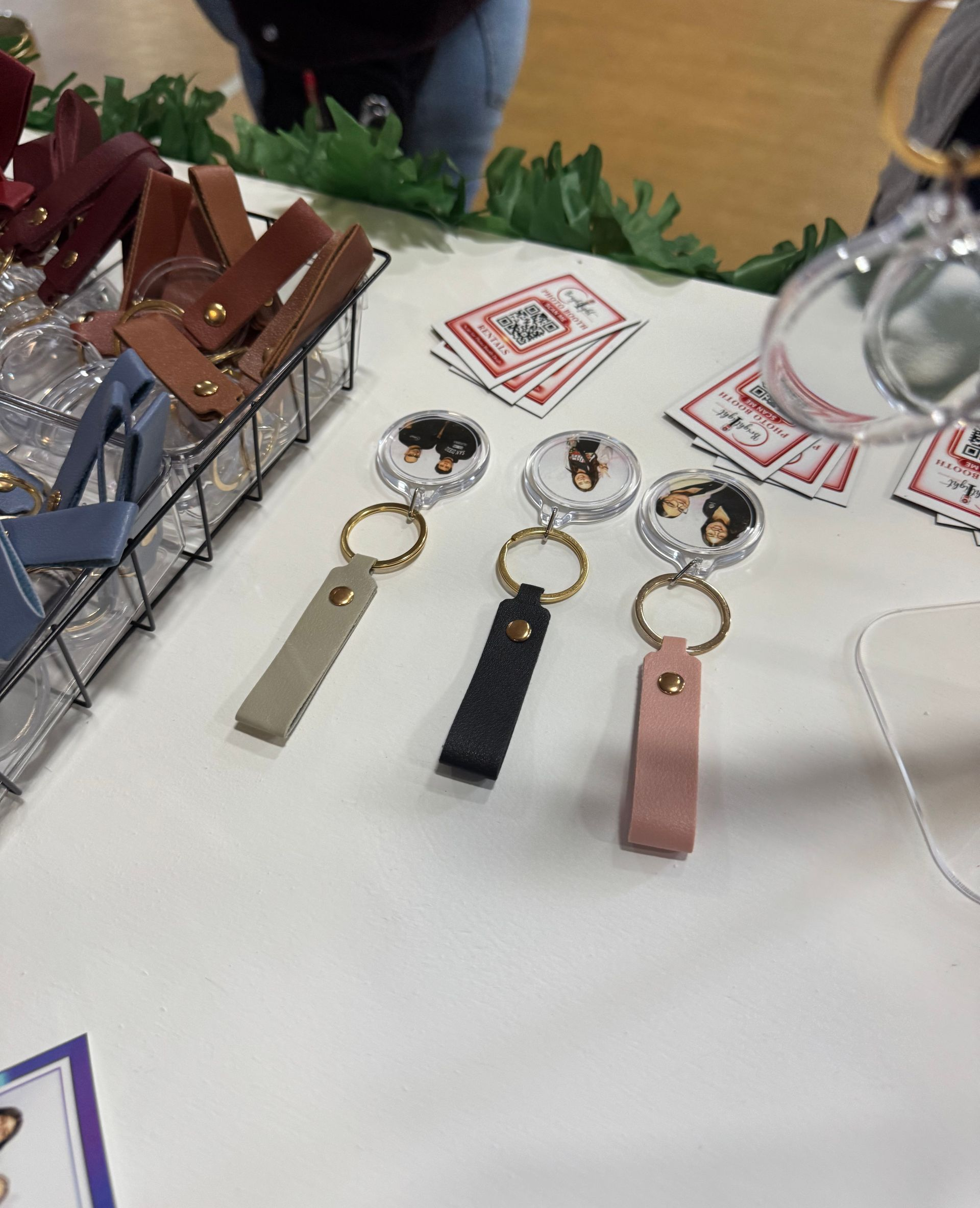 Custom photo booth keychain keepsakes with premium leather straps
