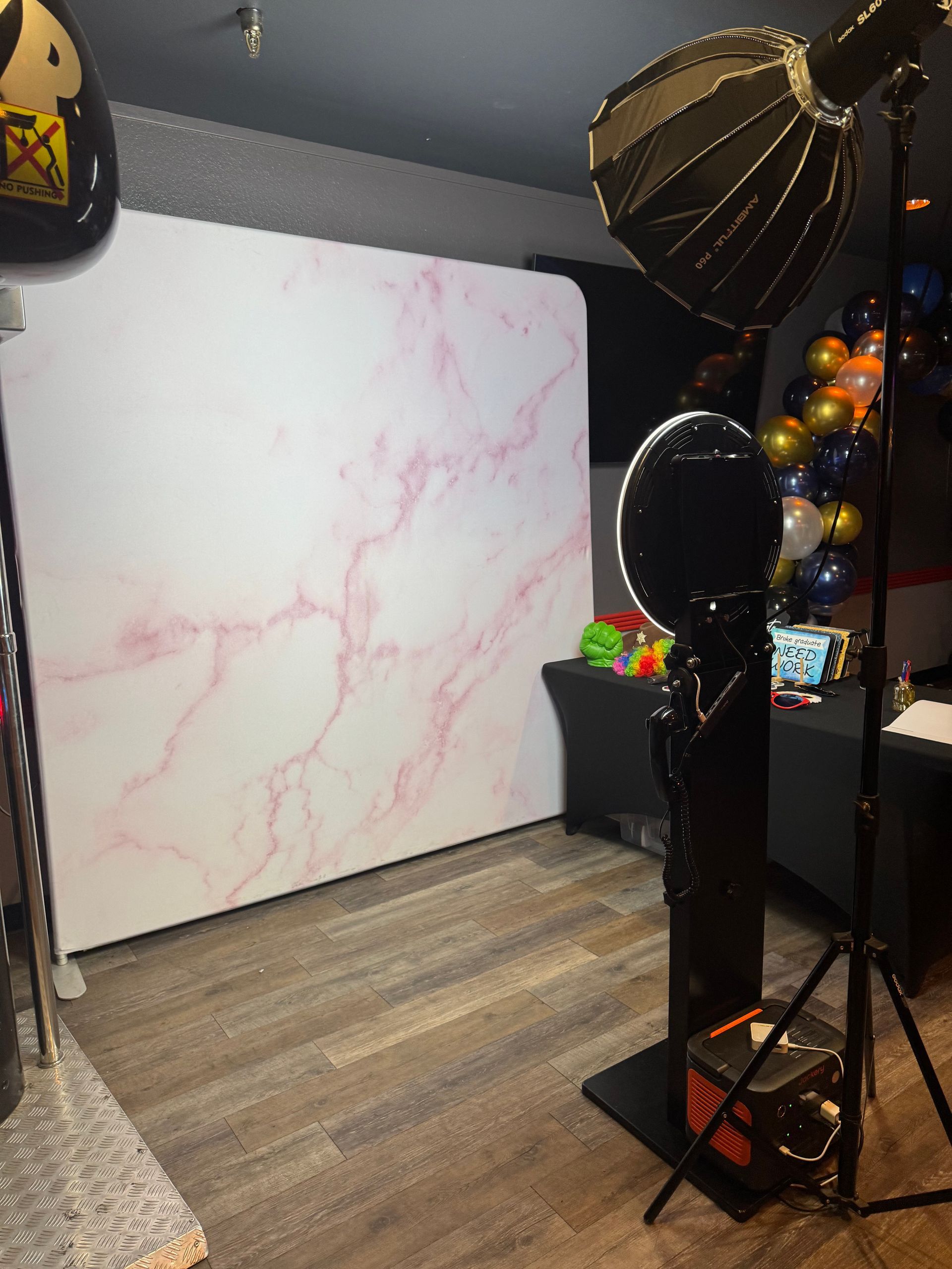 Signature photo booth setup for a quinceañera