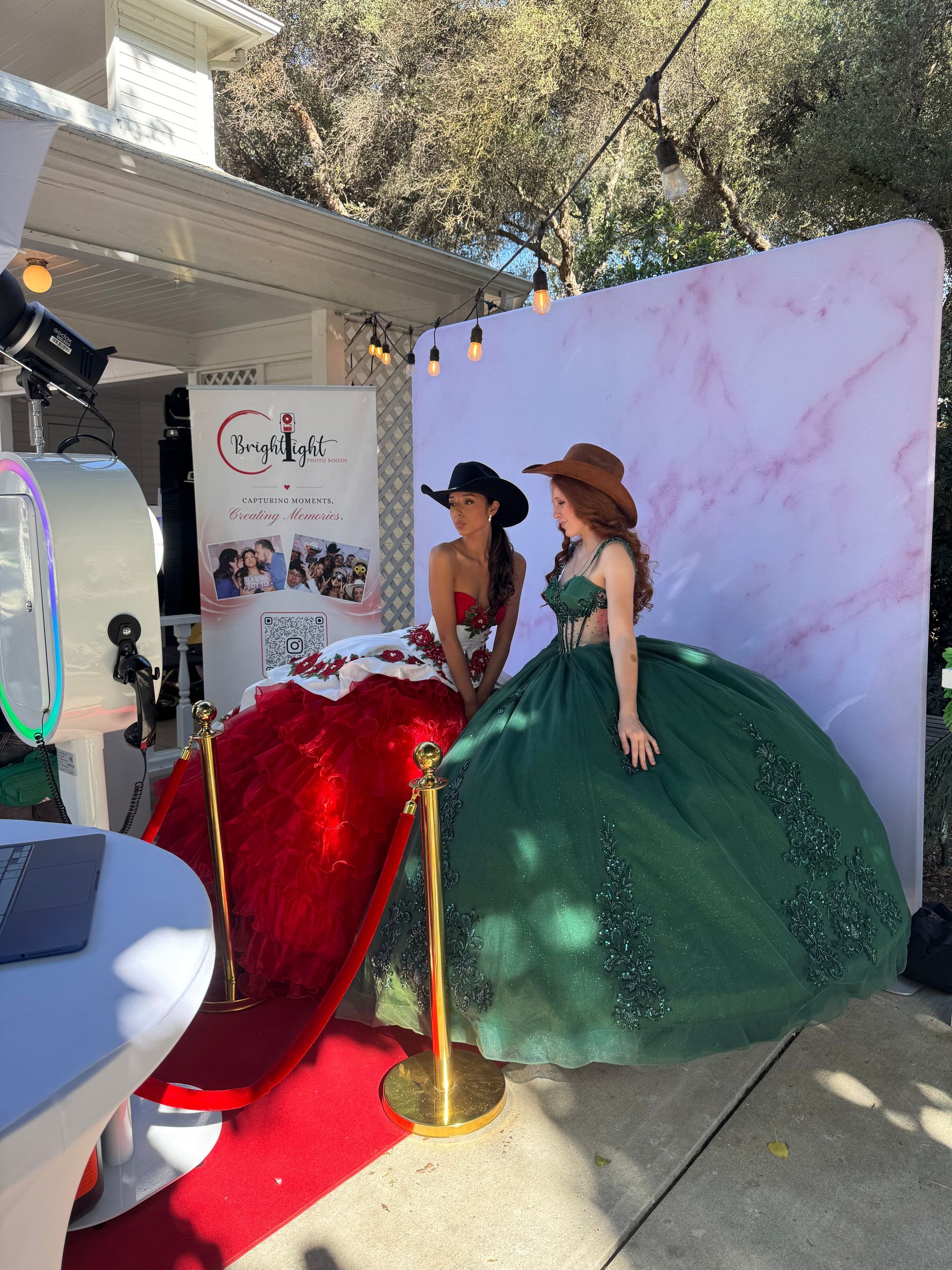 Elegant quinceañera photo booth setup with premium backdrop