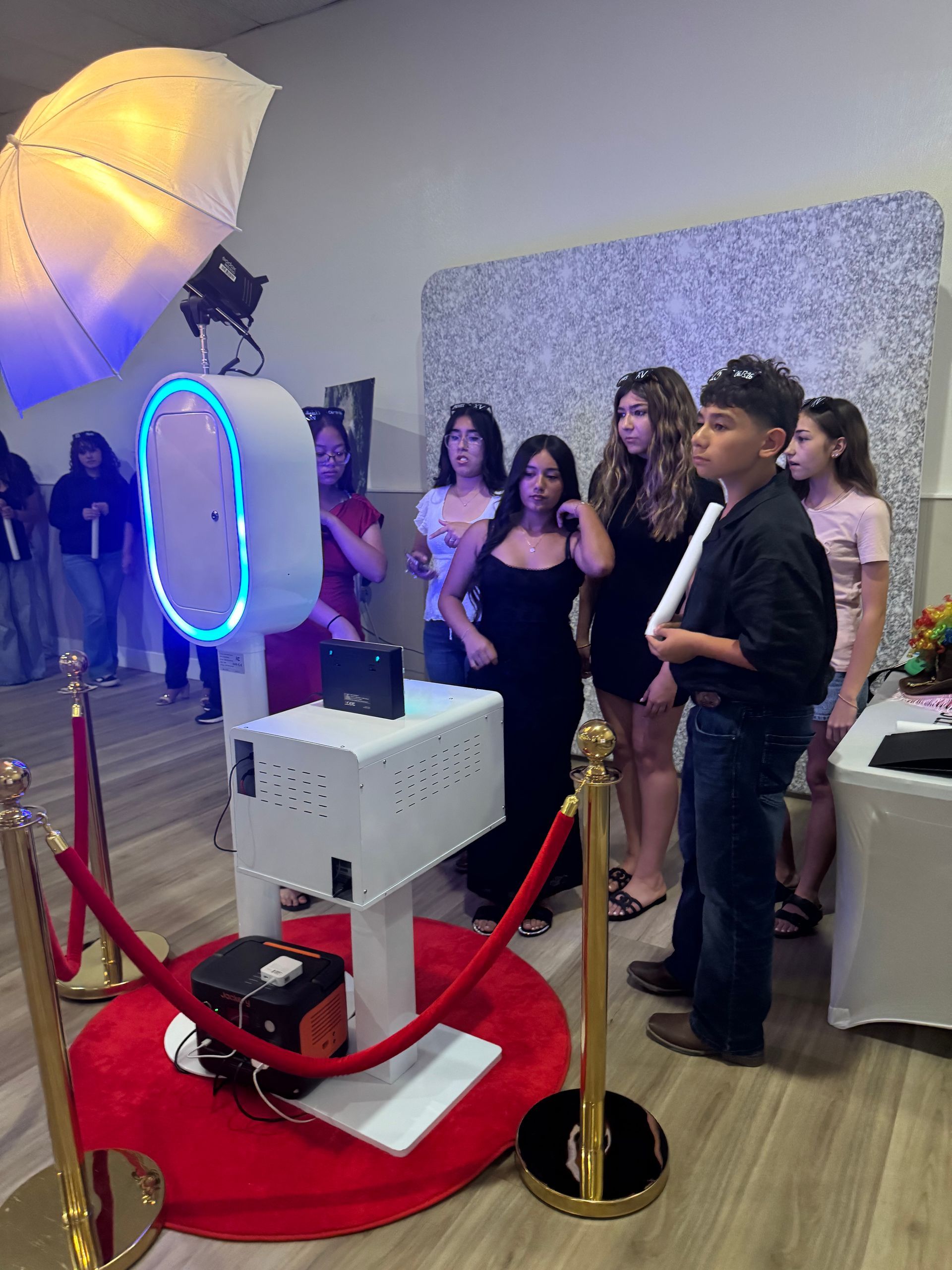 Guests lined up to enjoy the Brightlight Luxury Photo Booth at Ariel's Quinceañera in Hemet, CA