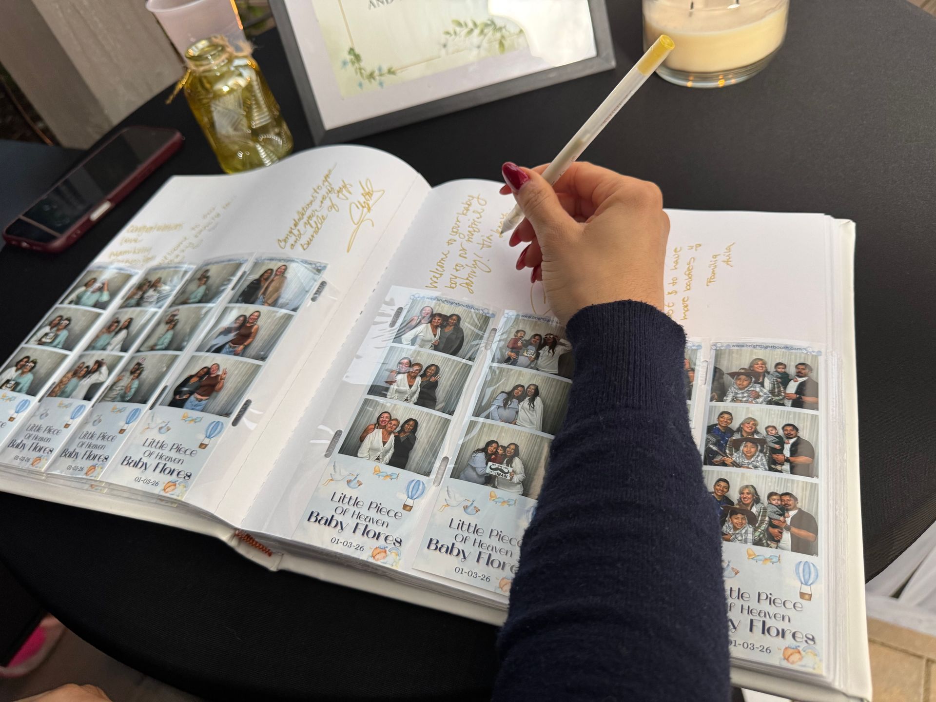 Wedding guestbook with photo booth prints and heartfelt messages by Brightlight Photo Booth