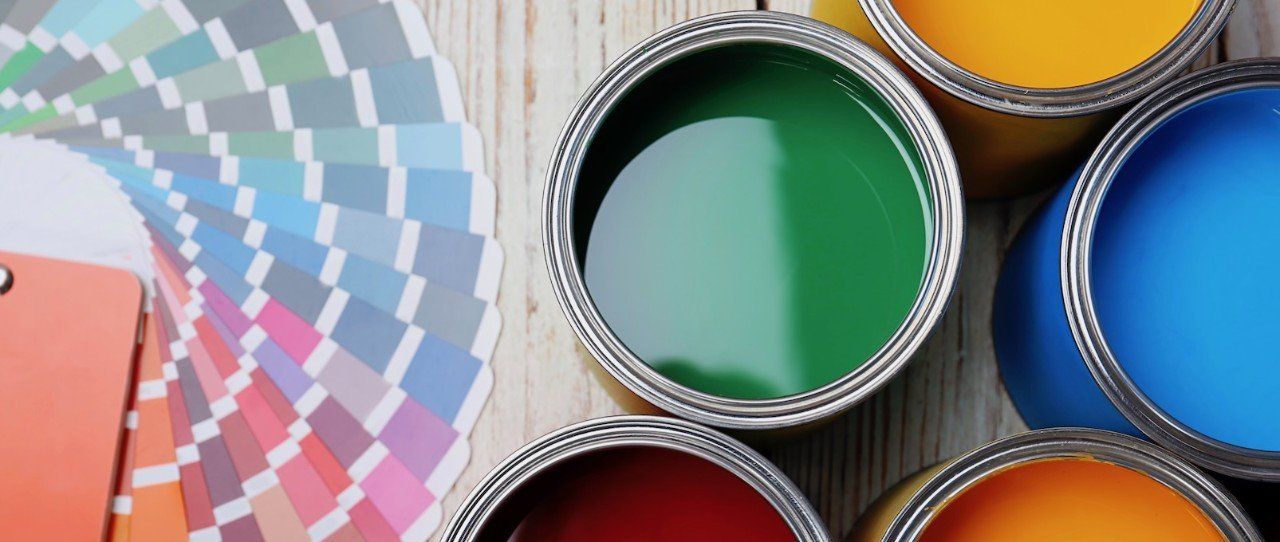 Paint cans with a color palette fan.