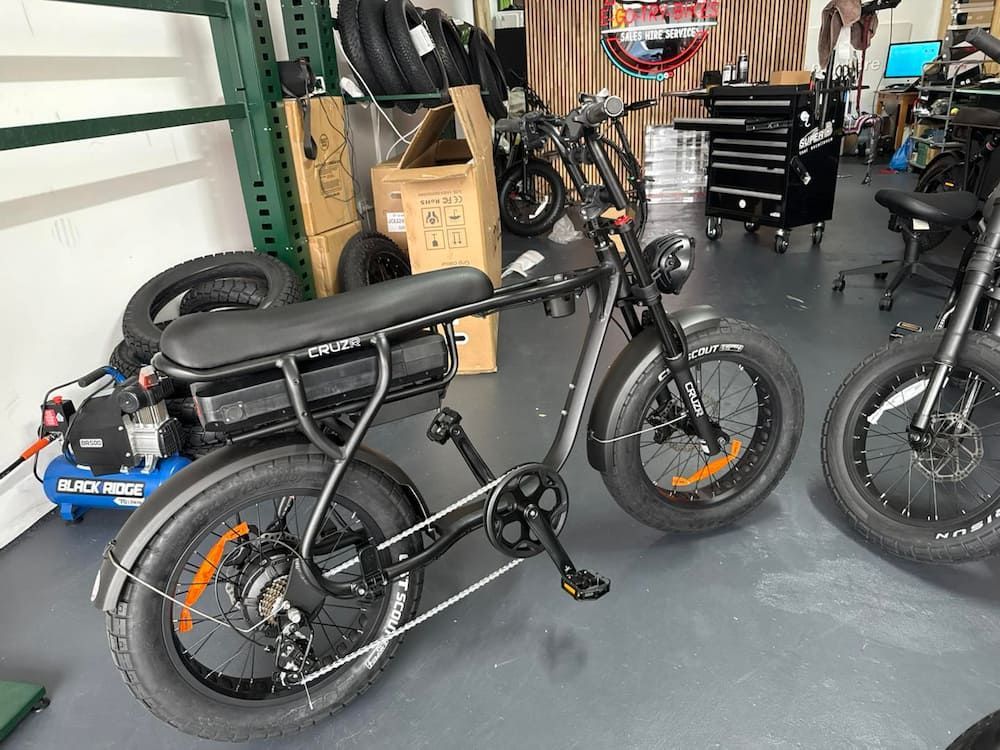 Black Electric Bicycle With Thick Tires in a Shop — E-Go-Try-Bikes in Nelson Bay, NSW