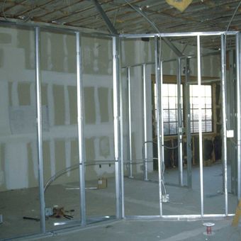 A room that is being remodeled with the number 25 on the ceiling