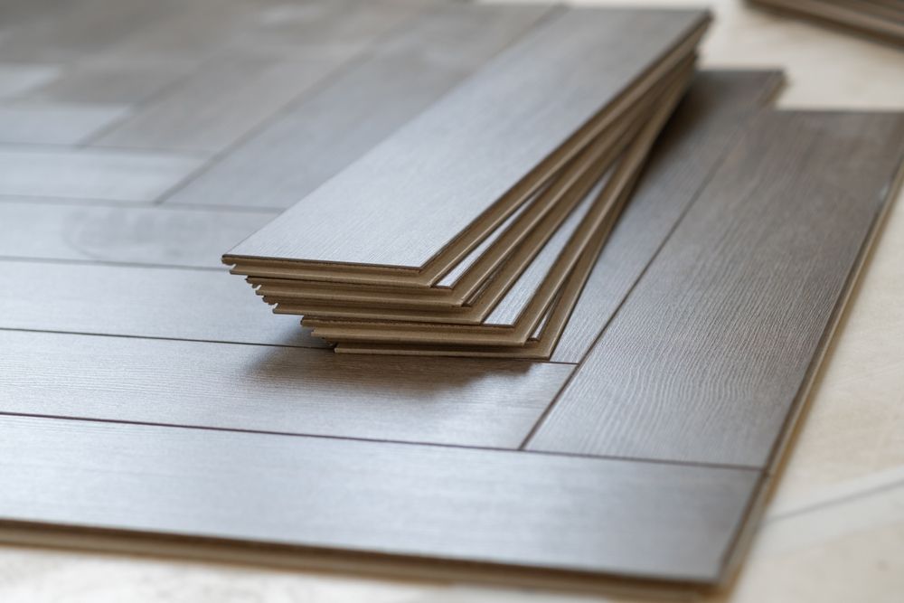 Stack of gray planks for flooring.