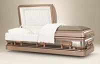 White-lined bronze casket with the lid open, showing a folded white blanket inside.