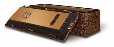 Brown and black metal rectangular footrest with decorative gold inlay, shown in side view