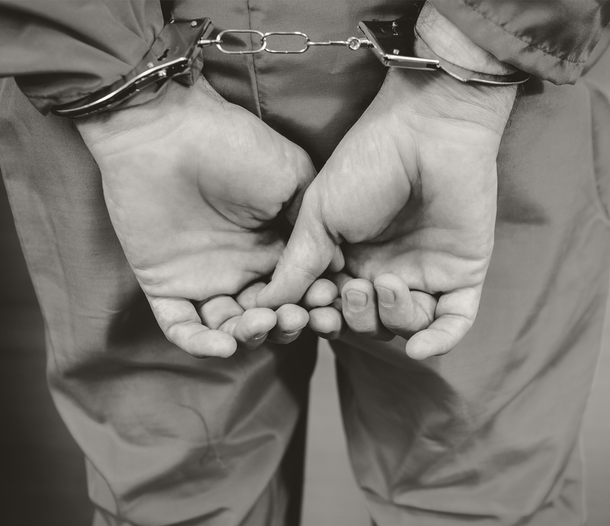 hands in handcuffs