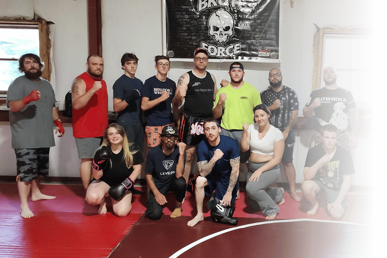Kids and adults practicing Jiu-Jitsu at Roberts Family Mixed Martial Arts in Orange, MA.