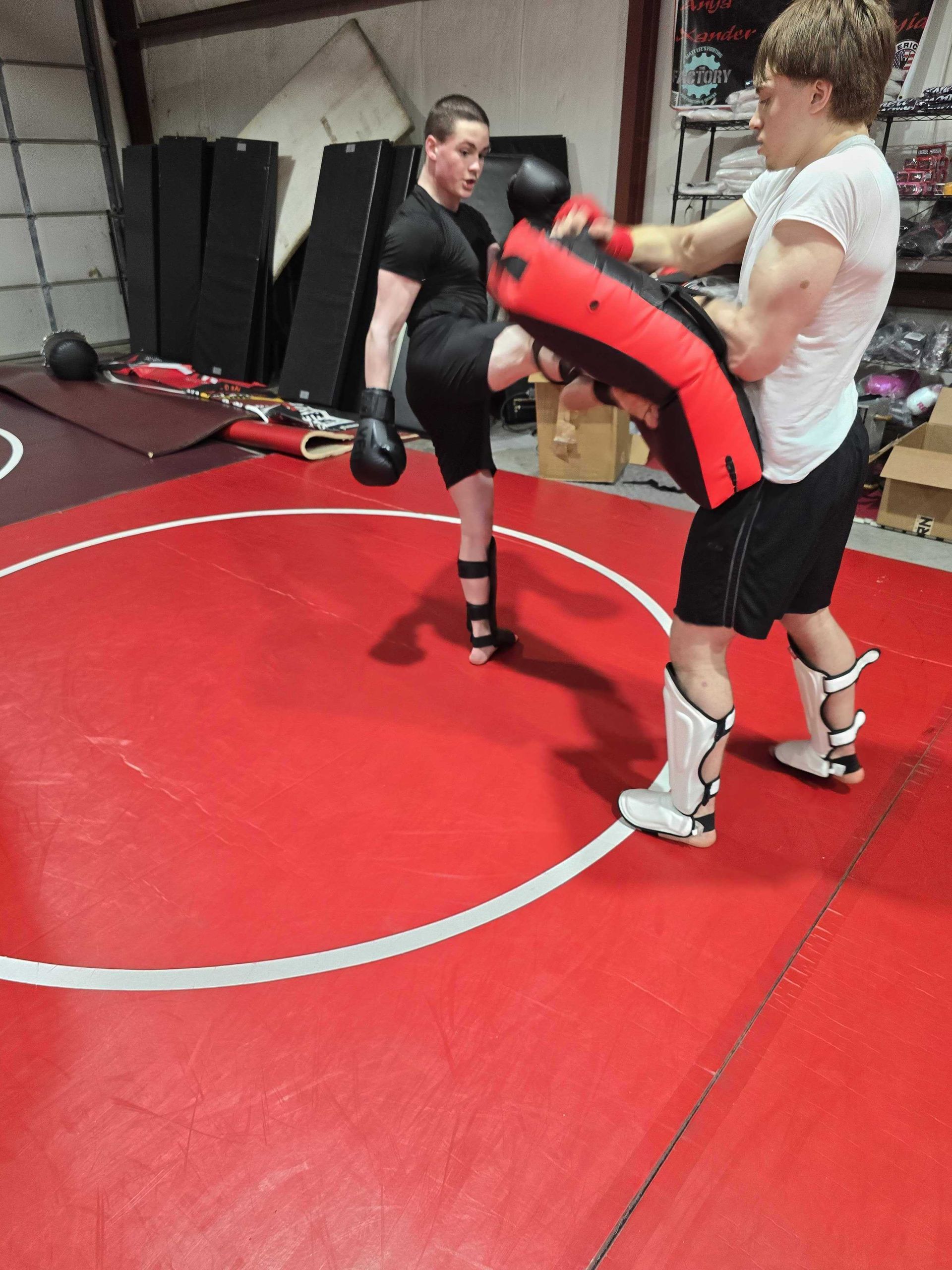 Students drilling Jiu-Jitsu technique at Roberts Family Mixed Martial Arts in Orange, MA, building fitness and confidence.