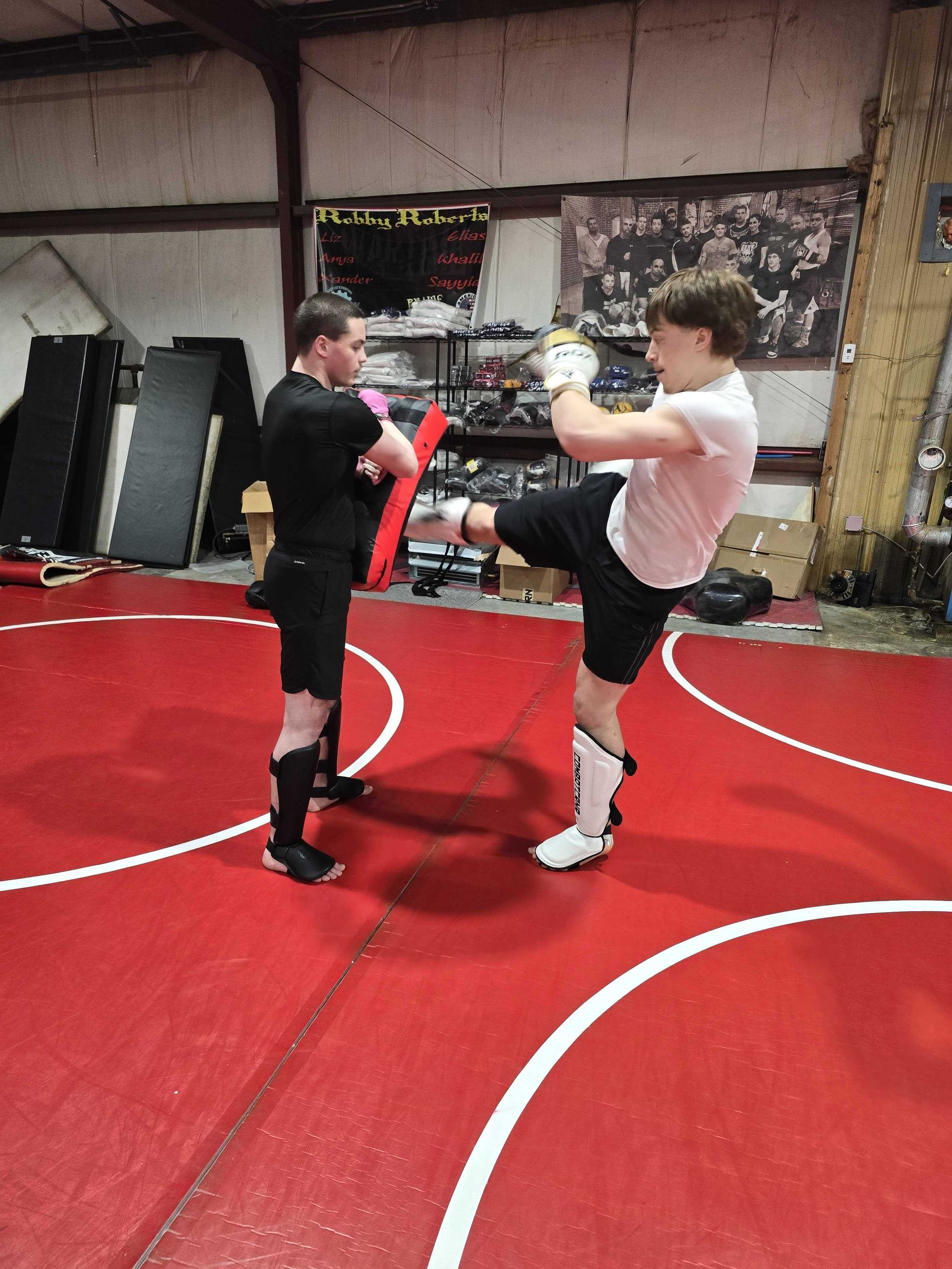 Students training Jiu Jitsu at Roberts Family Mixed Martial Arts in Orange, MA.