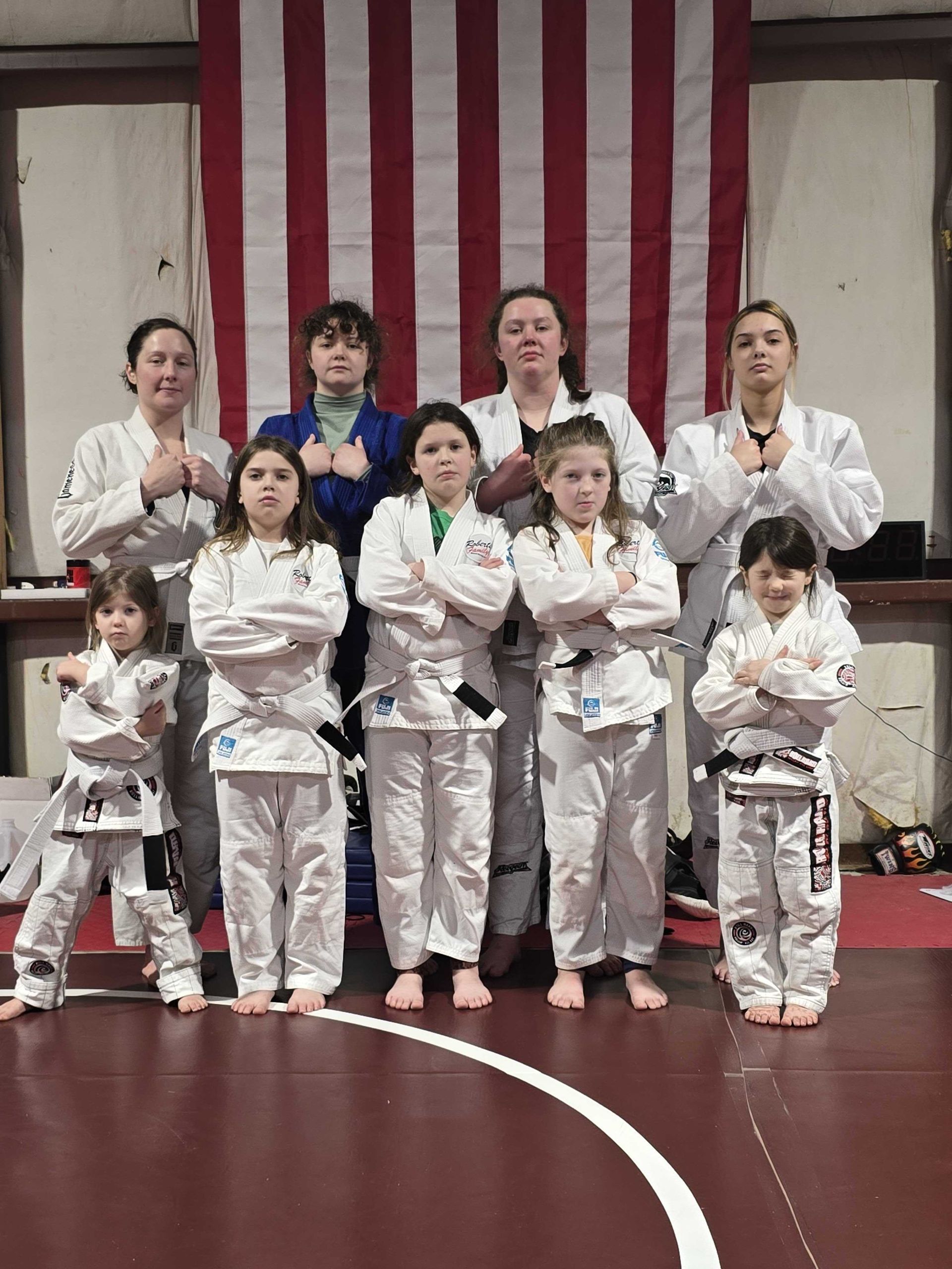Kids practicing partner drills at Roberts Family Mixed Martial Arts in Orange, MA.