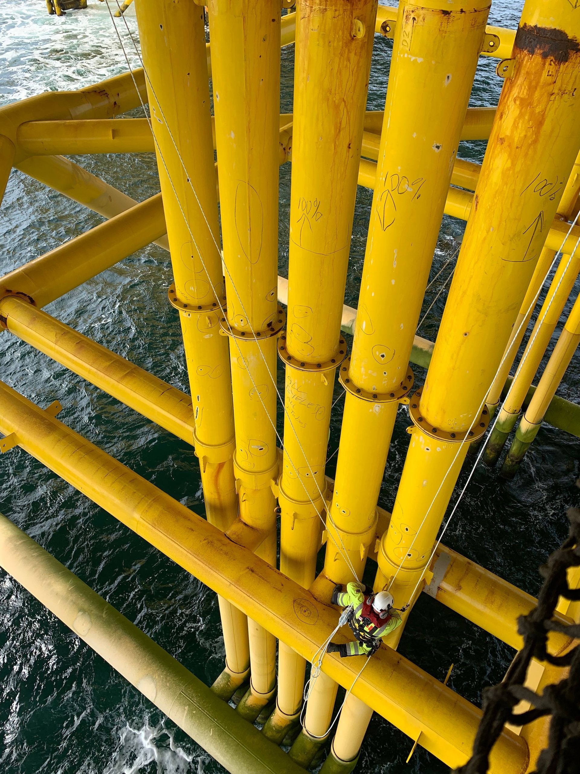 wind turbine j-tubes and caissons been inspected by Dangle's rope access team over water