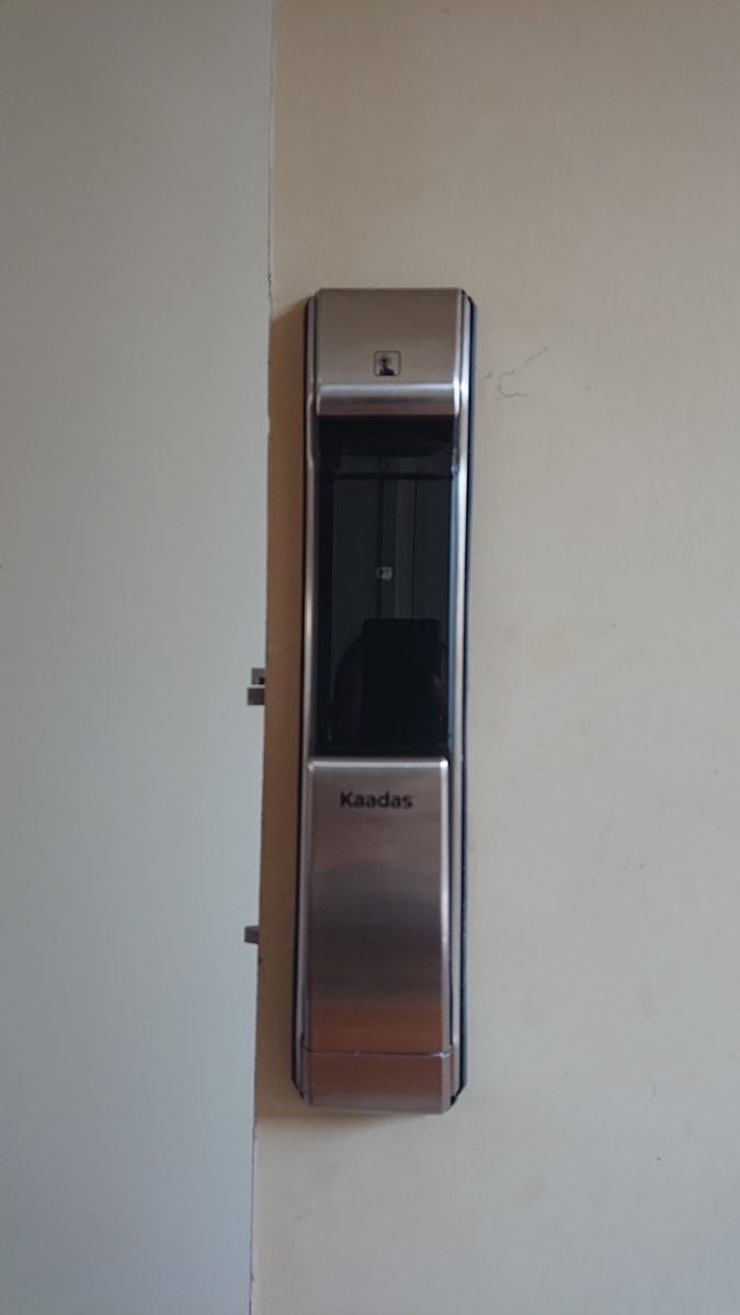 Kaadas Door Lock Is Mounted On A White Wall — Ontime Locksmiths & Security In Bangalow, NSW