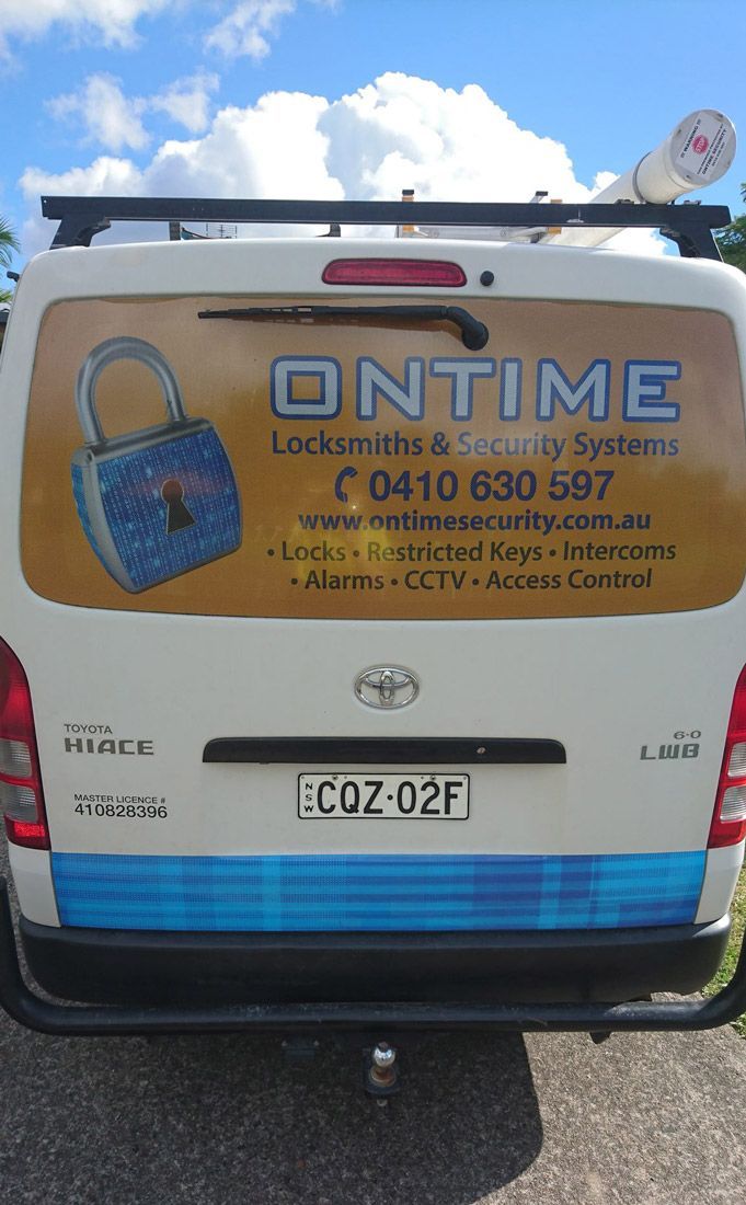 Back View Of Van Advertising Ontime Locksmiths And Security Systems — Ontime Locksmiths & Security In Mullumbimby, NSW