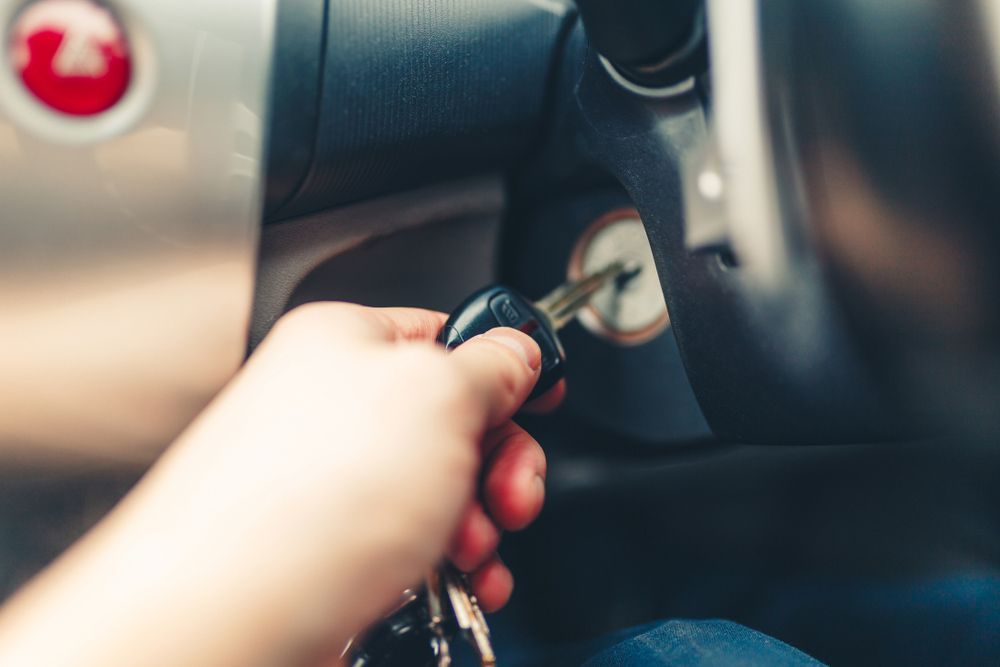 Pair Of Keys, Someone Putting In The Ignition Of A Car — Ontime Locksmiths & Security In Mullumbimby, NSW