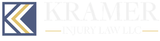 Kramer Injury Law LLC logo with stylized K in gray, navy, and gold on a white background