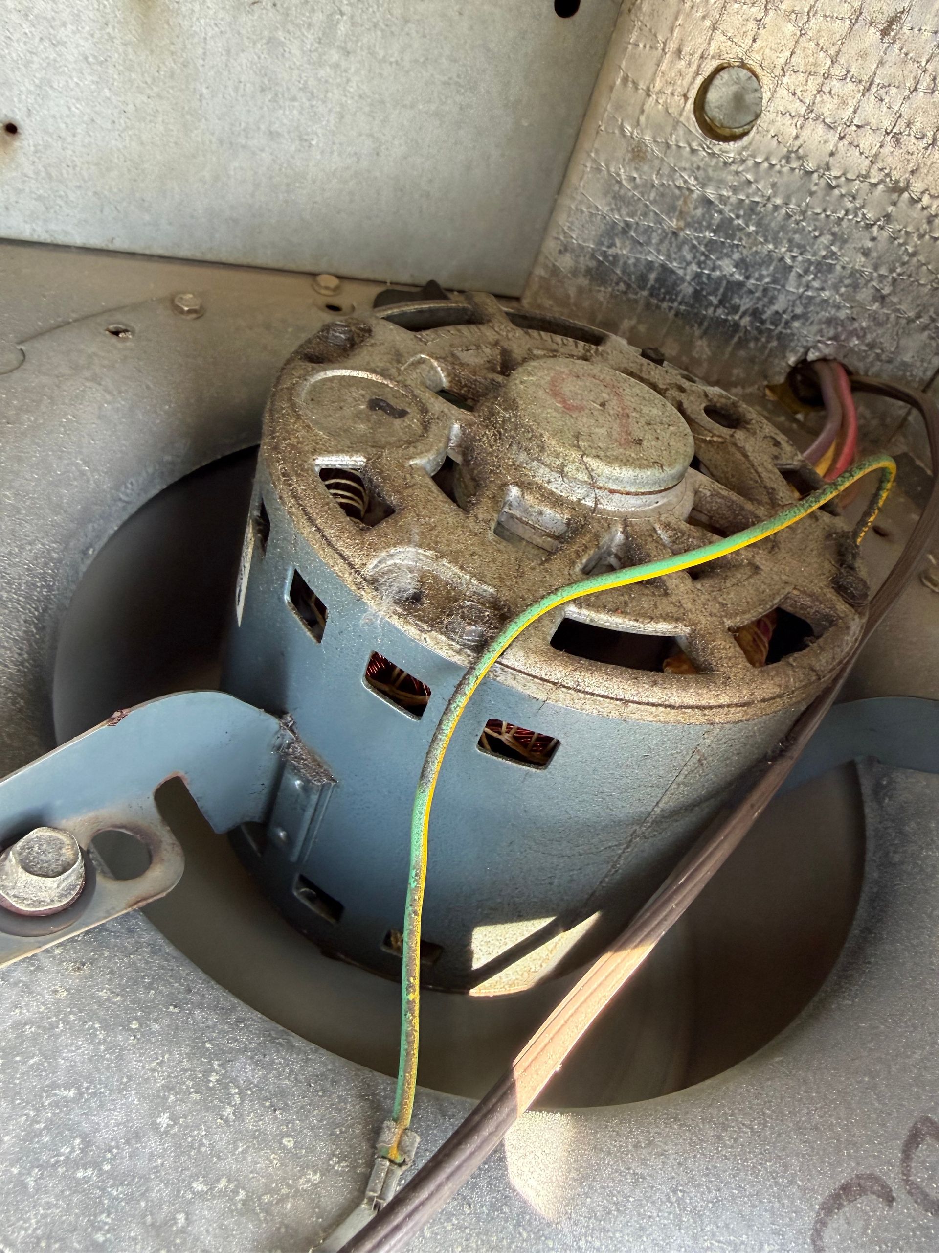 Blower motor coated in 18 years of dust and debris