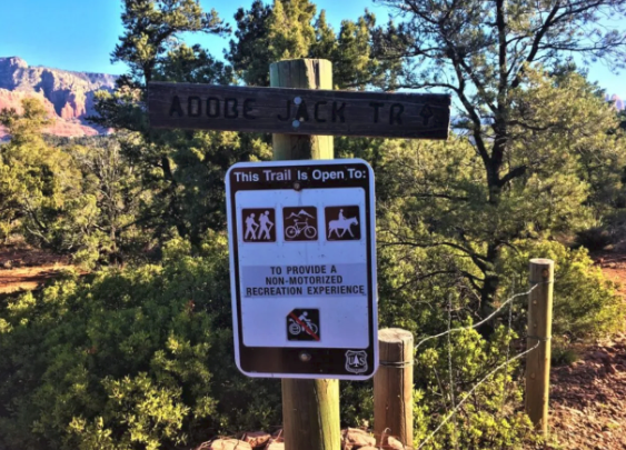 A sign that says this trail is open to anyone
