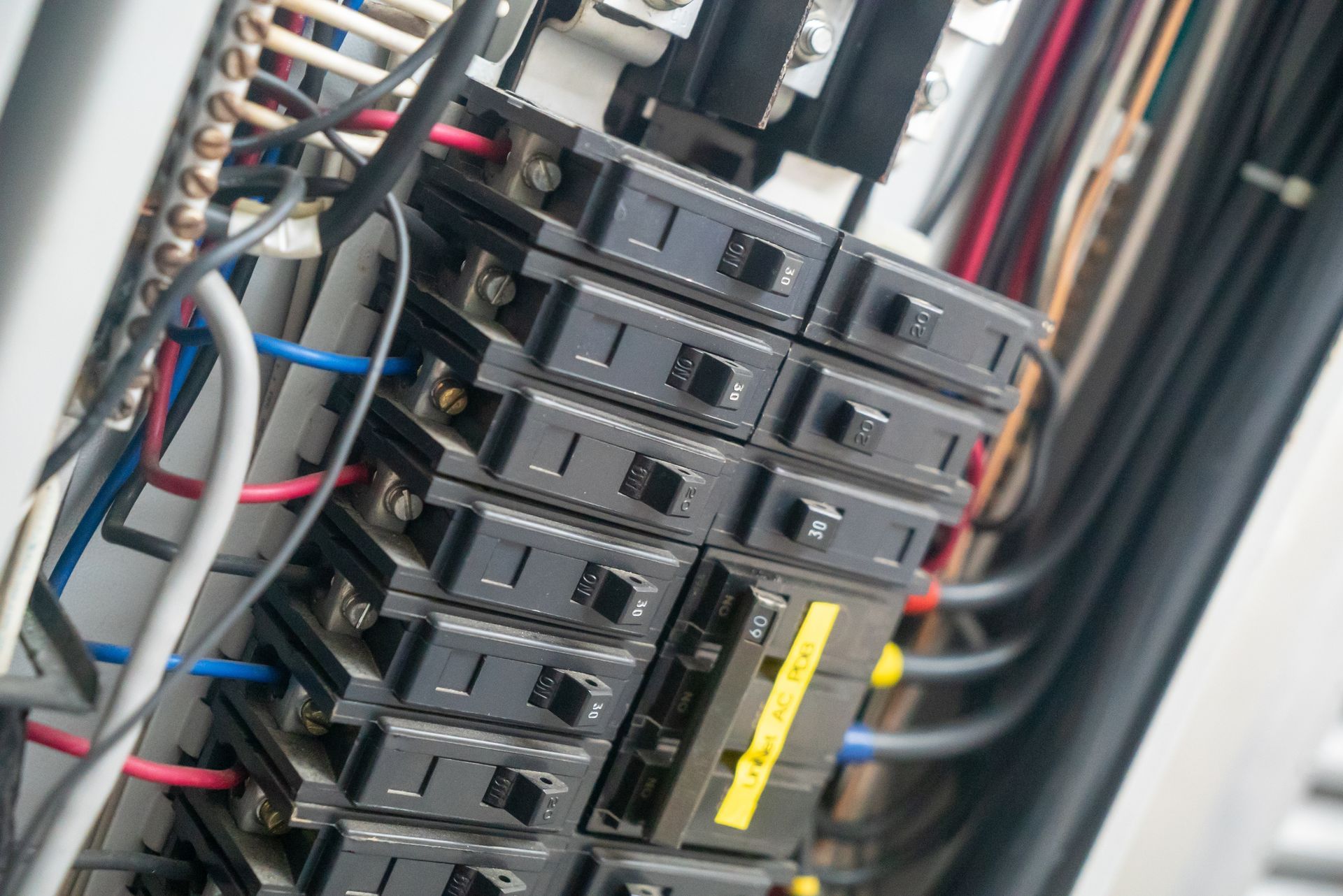 Close-up of stacked server modules and cables inside a data rack