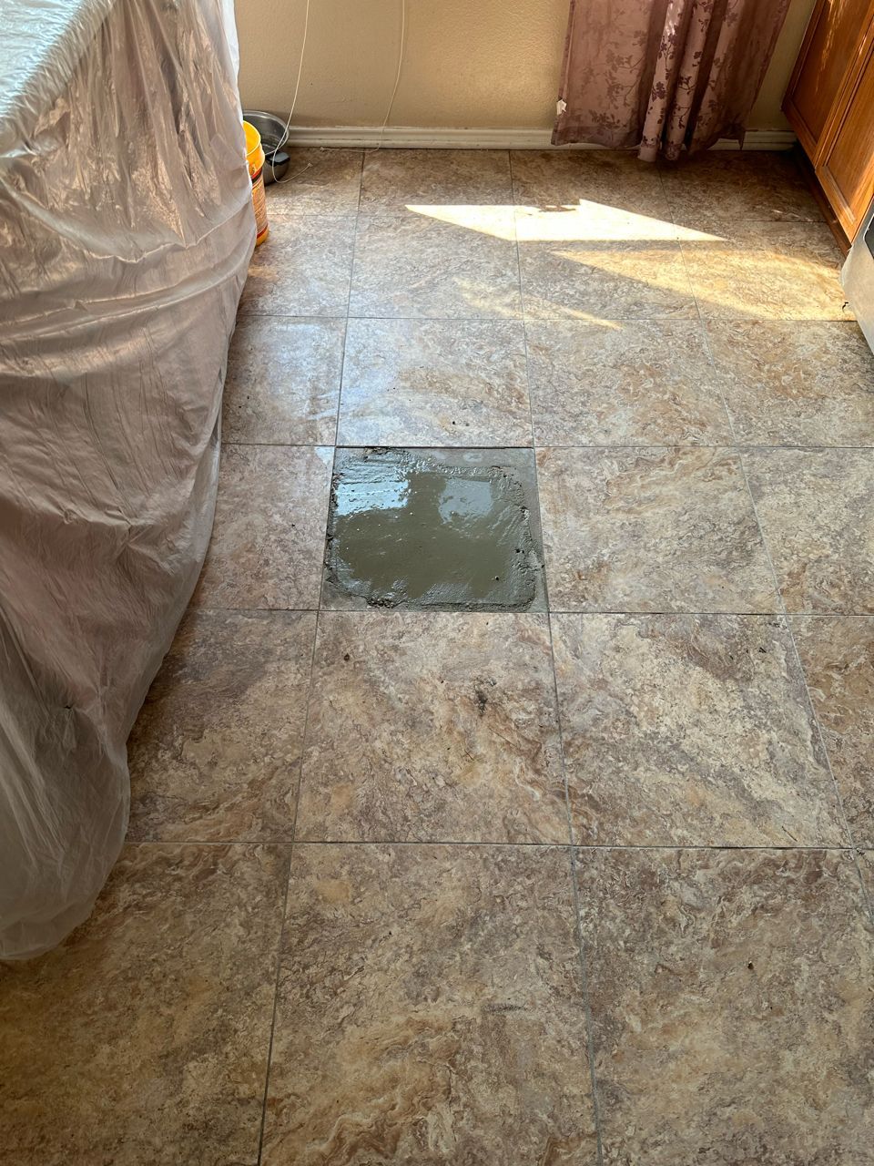 There is a hole in the floor in the middle of the room.
