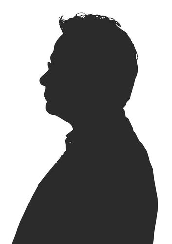 Johannes Brahms met lange baard, kijkt niet in beeld.