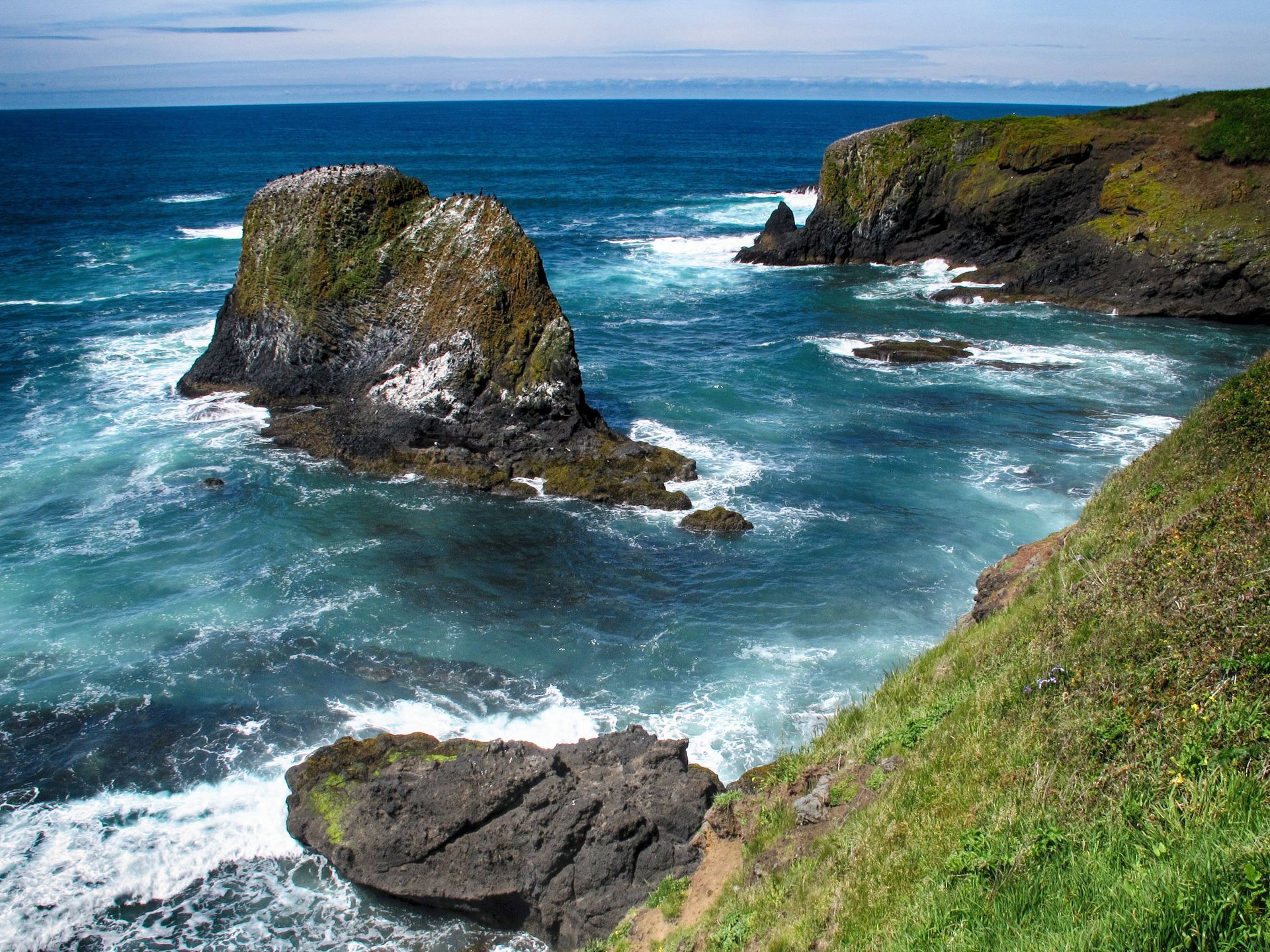 A scenic view of Yaquina Head Outstanding Natural Area in Oregon A scenic view of Yaquina Head Outstanding Natural Area in Oregon