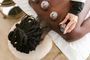 A woman is getting a cupping treatment on her back.