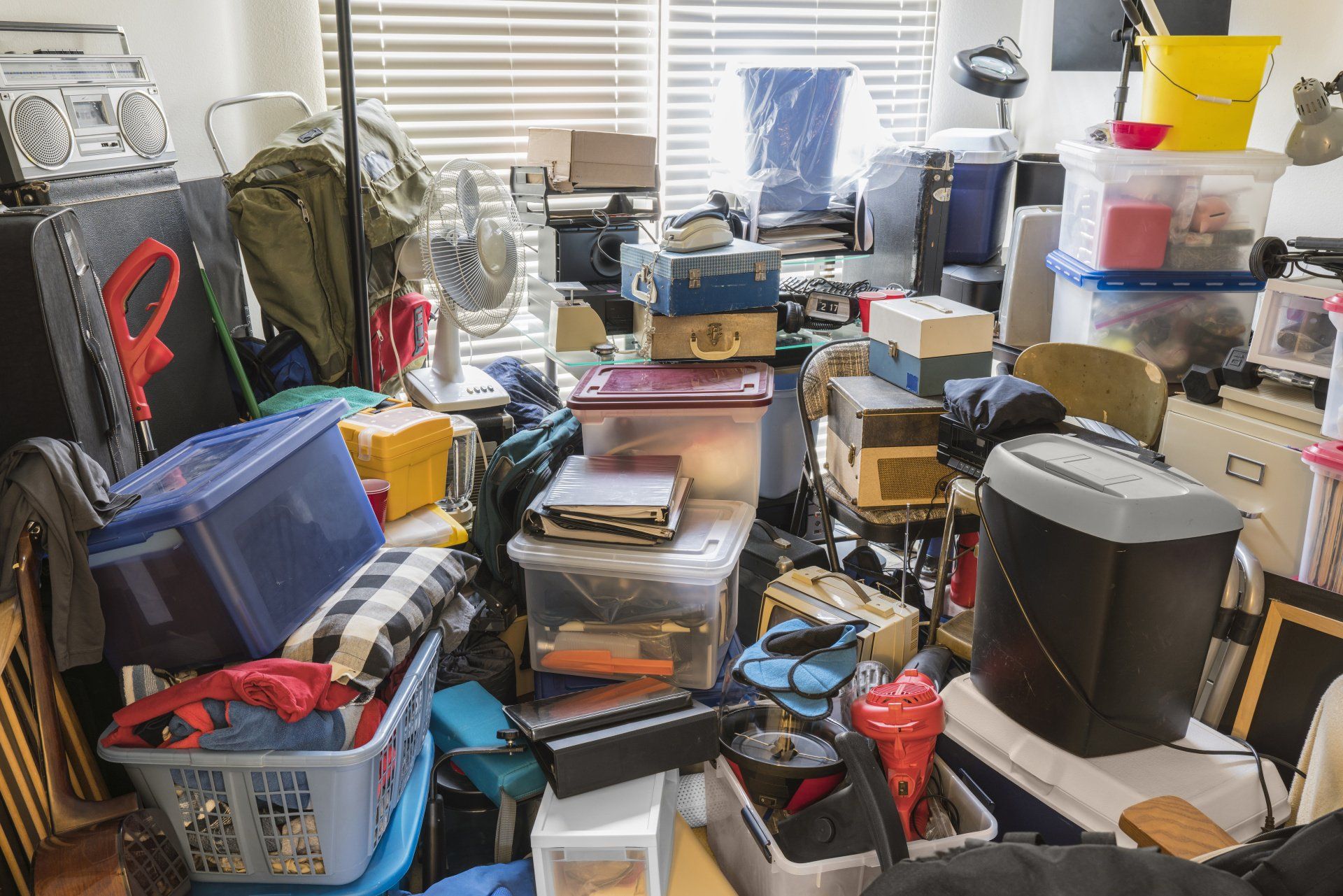 A room filled with lots of boxes and containers.
