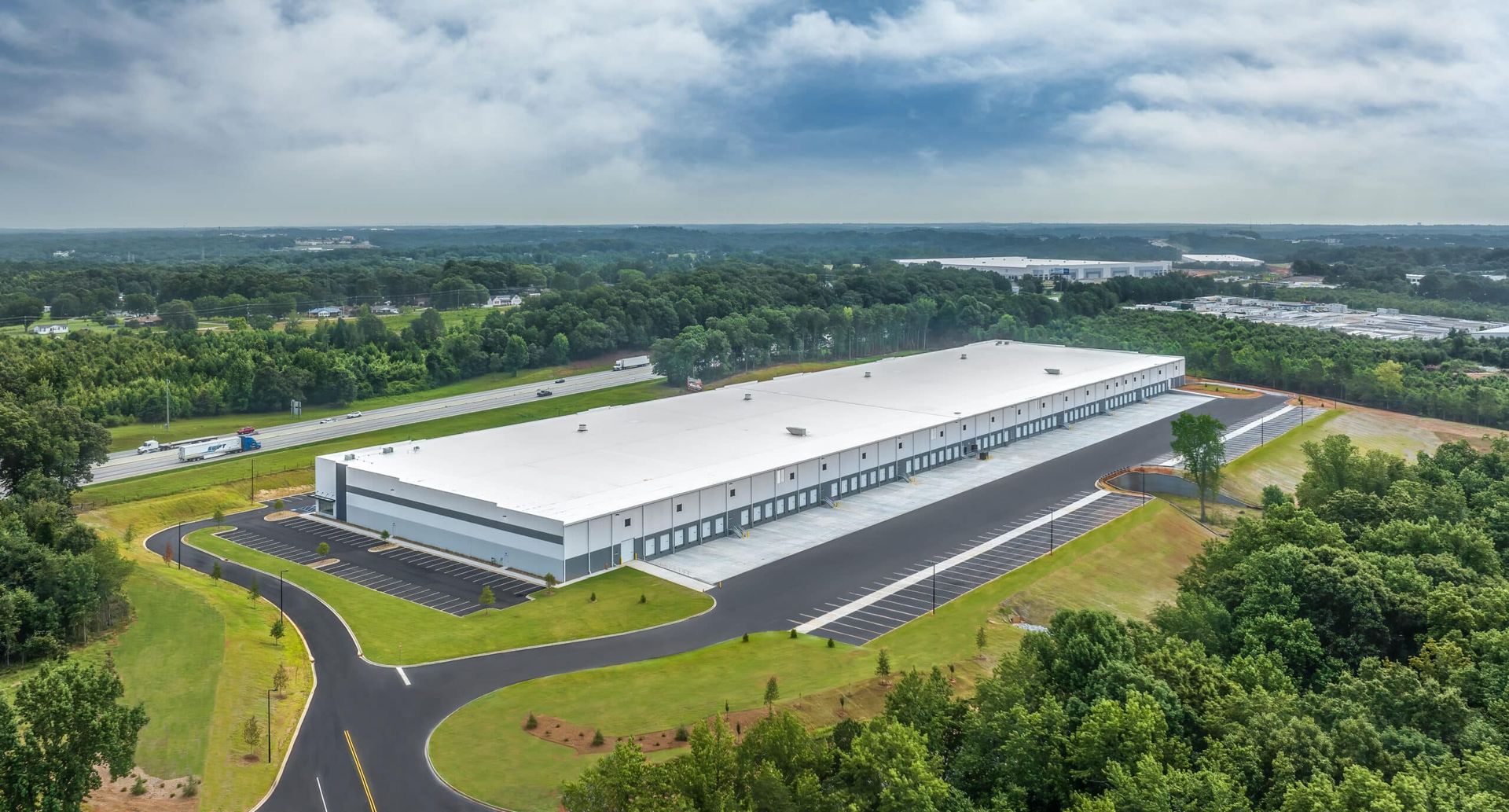 Warehouse facility in Sugar Hill, Georgia with clean floor areas and organized industrial racking