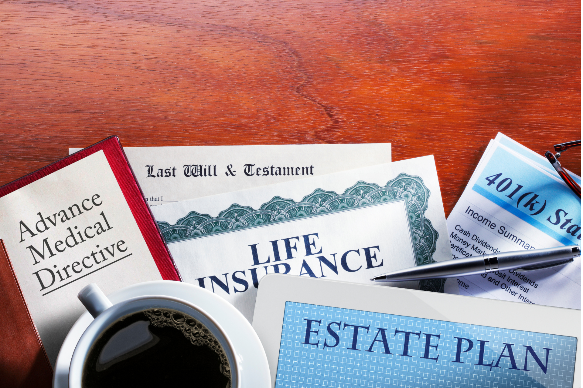 Estate planning documents, including advance medical directive, will and testament, life insurance, and 401(k) forms.