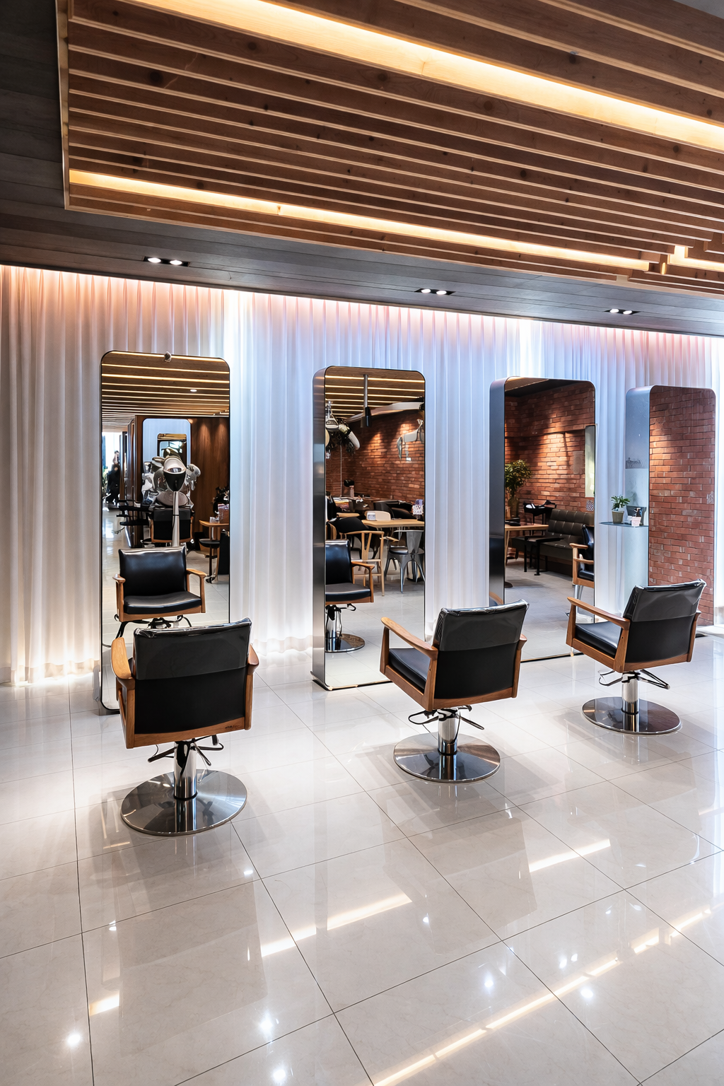 Open, bright salon floor — inside JUNO HAIR Myeongdong Branch 4