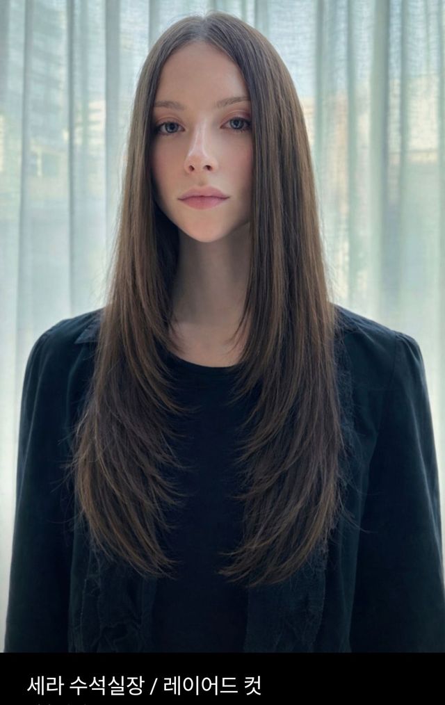 Long layered cut with soft waves at JUNO HAIR Myeongdong
