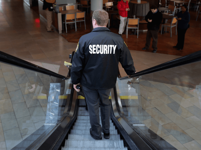 San Diego unarmed guard conducting foot patrol around retail plaza