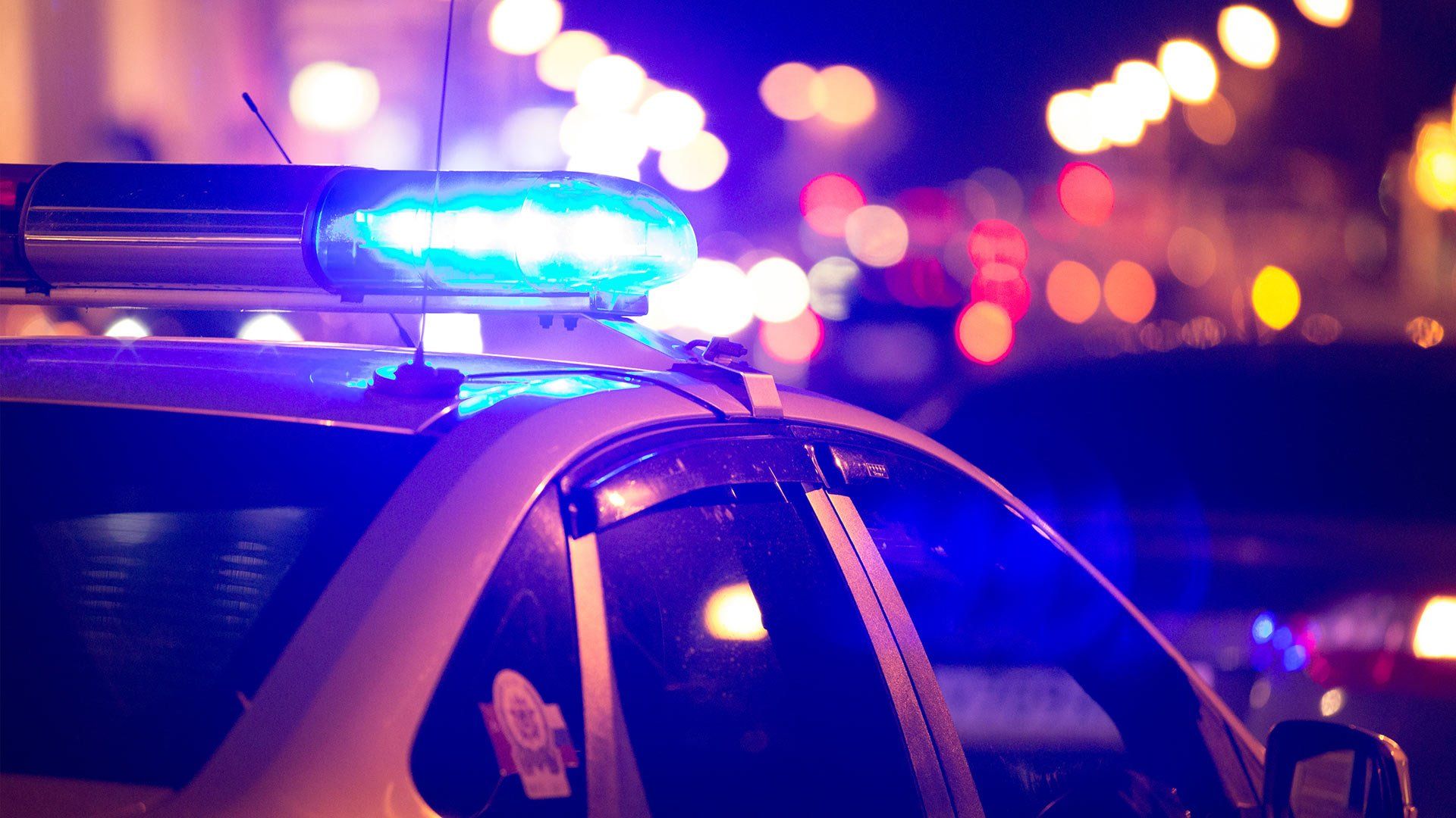 Patrol driver calling dispatch during late-night shift in San Diego