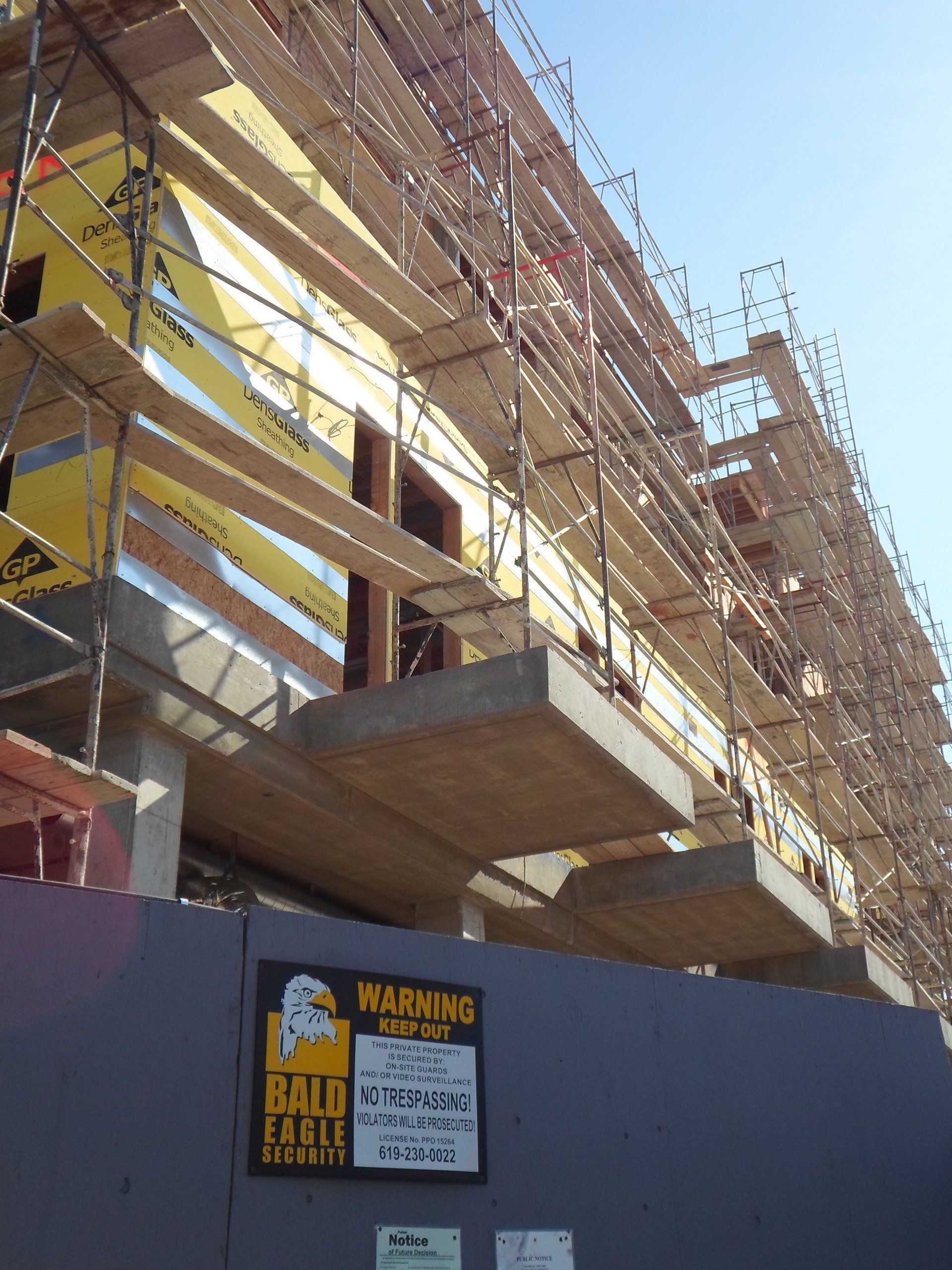 Security guard providing site protection at new construction project in San Diego