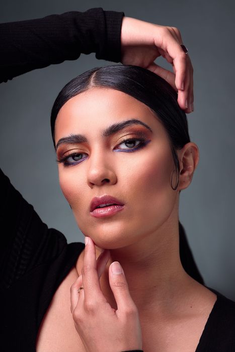 Bold and Majestic – A striking portrayal of modern royalty for the 'Face of Queens' campaign, January 2024. This look highlights the richness of Indian beauty, with shimmering bronze tones and a touch of color that captures the essence of a queen's poise
