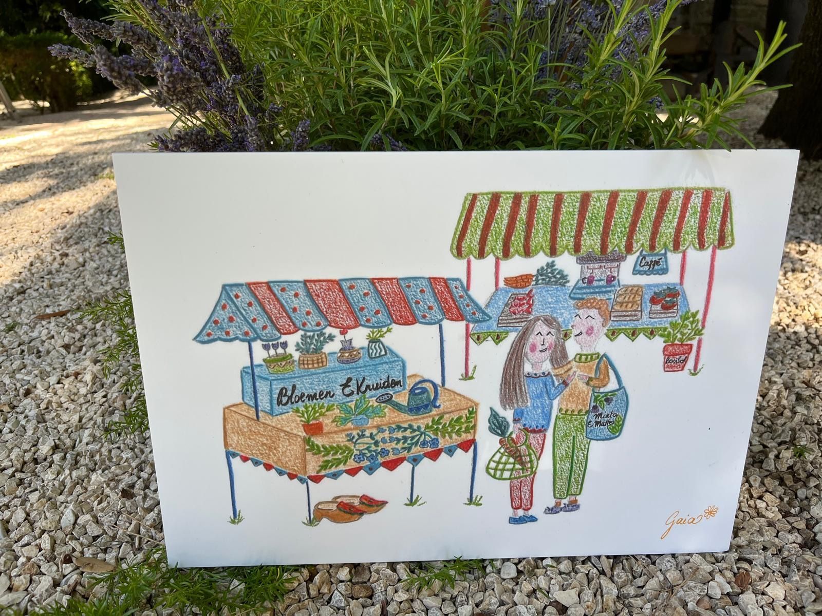 Hand-drawn market stand with striped awnings, produce, and two people in front, displayed outdoors on a white board