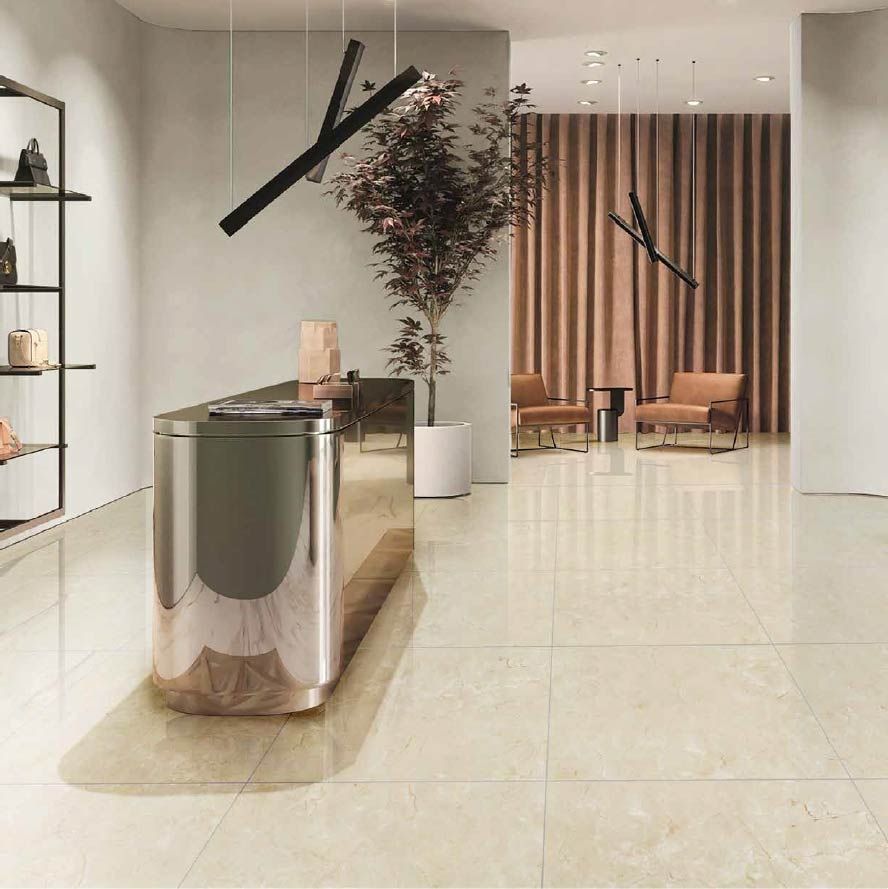 Vestíbulo moderno y minimalista con suelo de mármol brillante, iluminación escultural y zona de estar con detalles de madera.