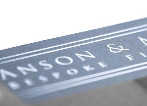 A close up of a business card for anson & mills