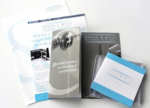 A brochure for anson & mills sits on a table