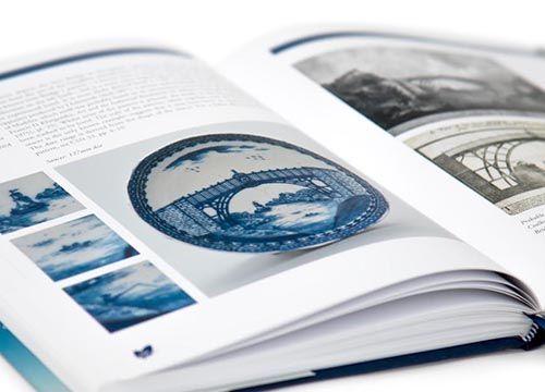 a caughley blue and white patterns book is open to a page with a picture of a plate on it