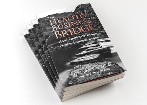 a stack of books titled the healthy business bridge .