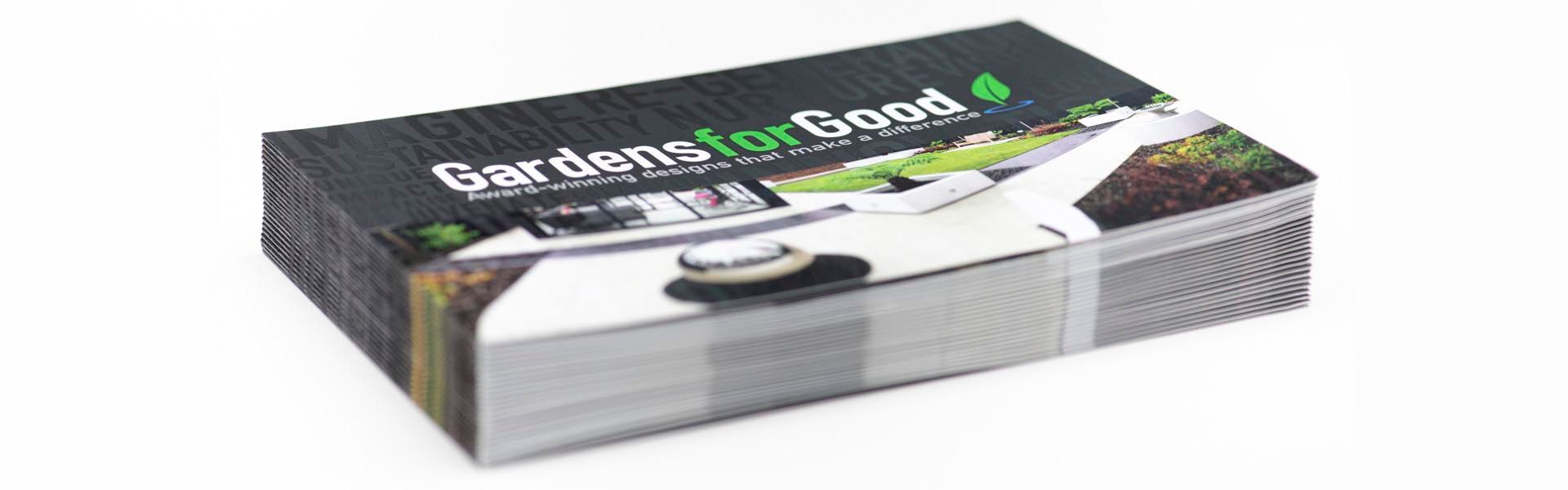 a stack of brochures for gardens for good